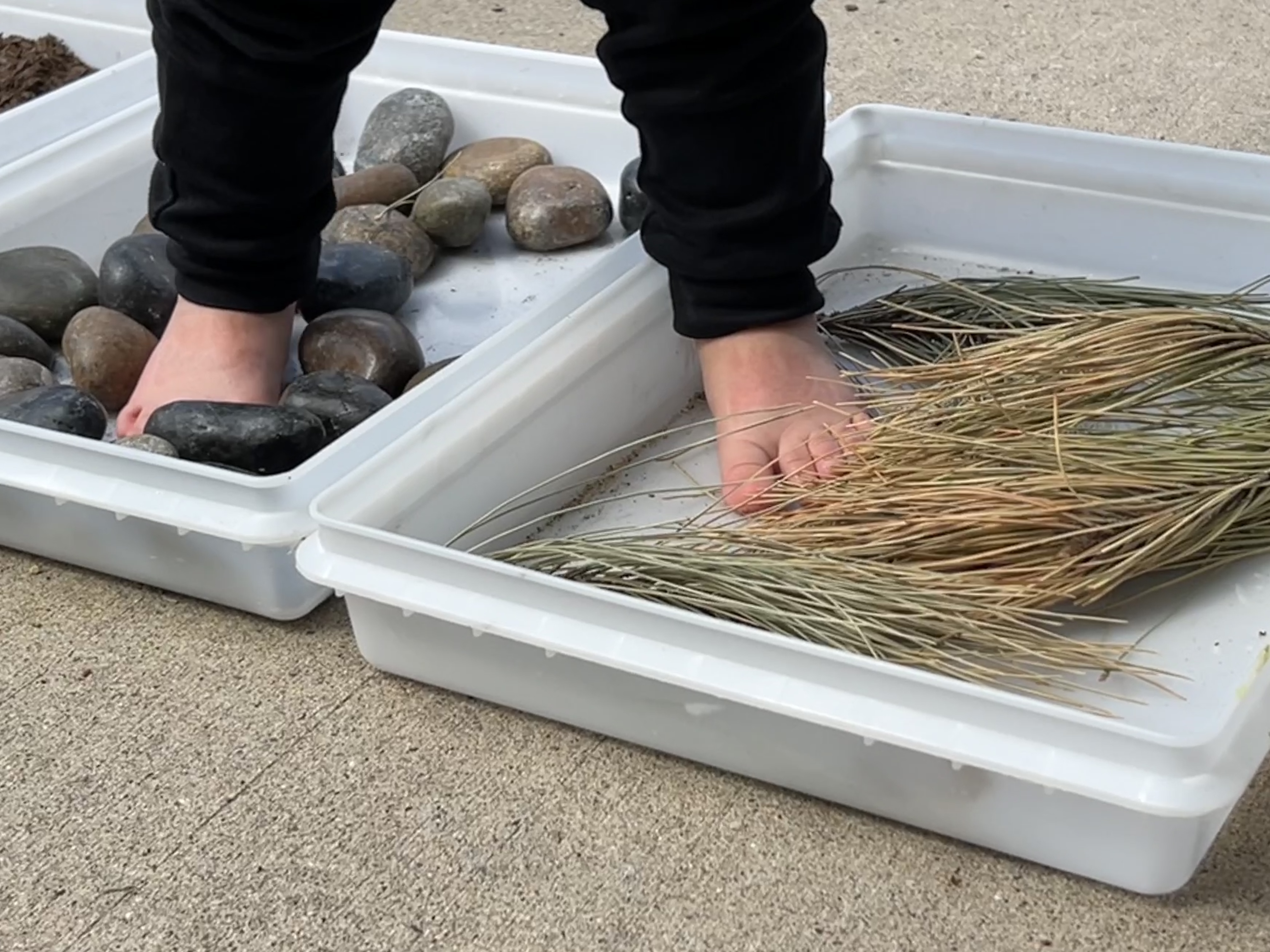 baby steps on stones and straw sensory path